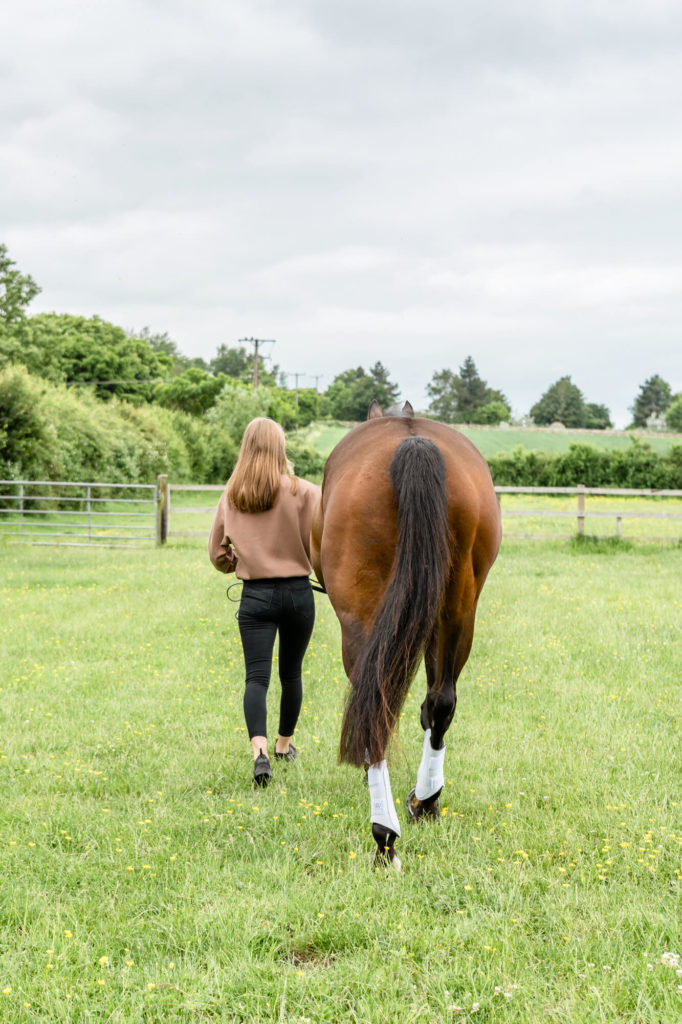 A young eventer and her bay thoroughbred bare. Equine photographer Buckinghamshire