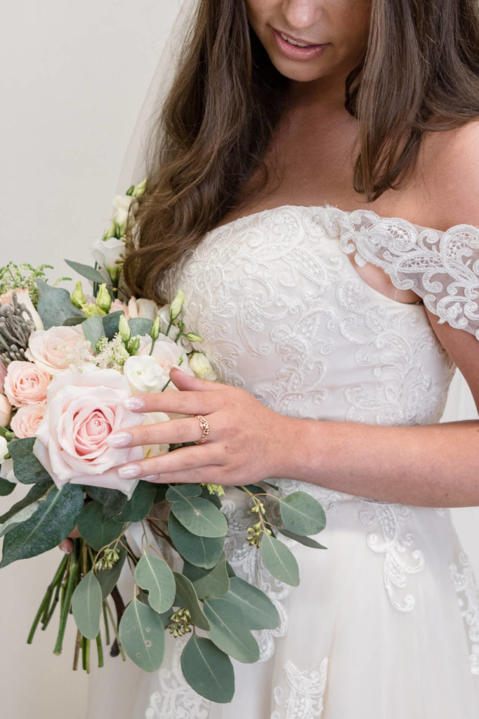 Chloe Bolam Wedding Photographer Buckinghamshire close up of a pink bouquet from The Flower Boutique MK