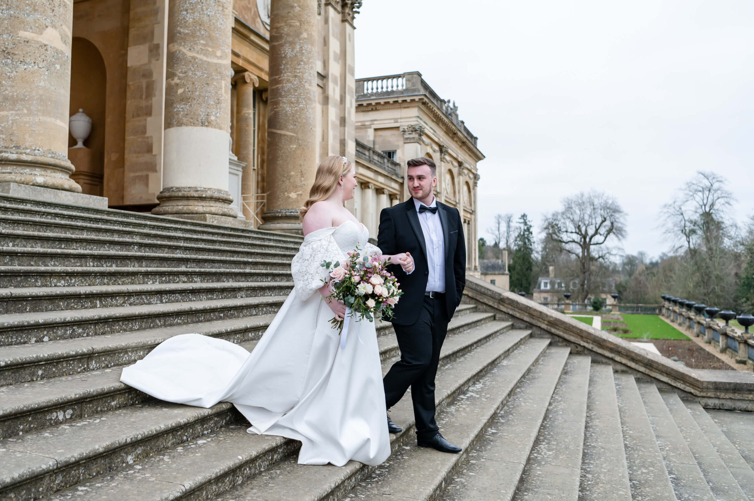 Stowe House Wedding Venue - Buckinghamshire UK wedding photographer Chloe Bolam - couple portraits walking down the stairs