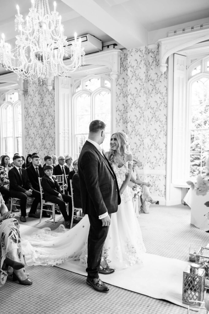 The bride walking down the aisle at her Rowton Castle wedding 
