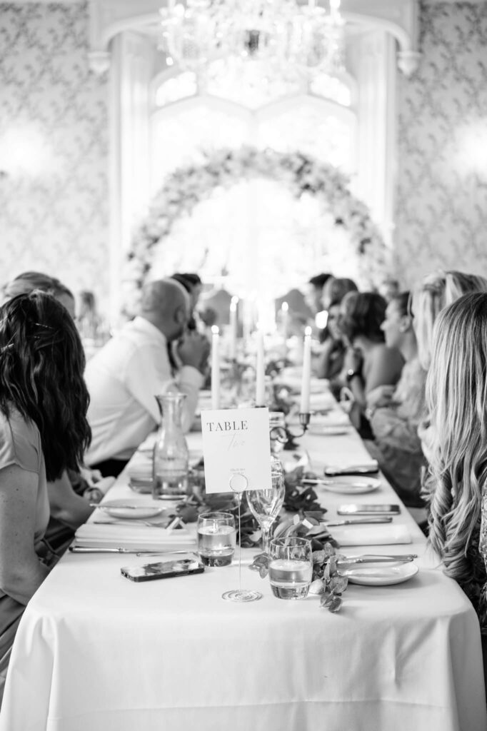 The guests enjoying food and drinks at a Rowton Castle wedding 