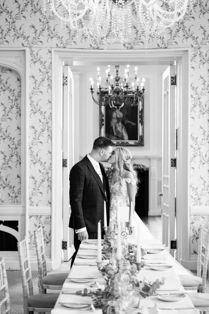 The couple standing inside of their Rowton Castle wedding 