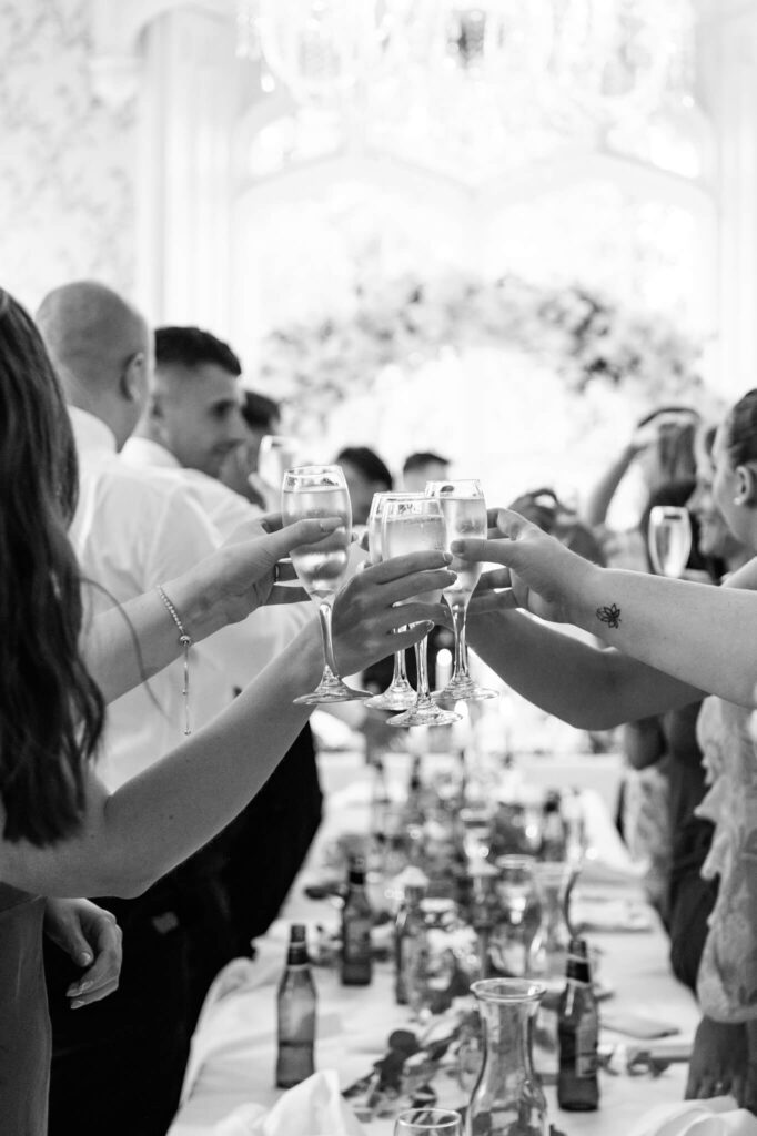 The guests enjoying drinks at a Rowton Castle wedding 