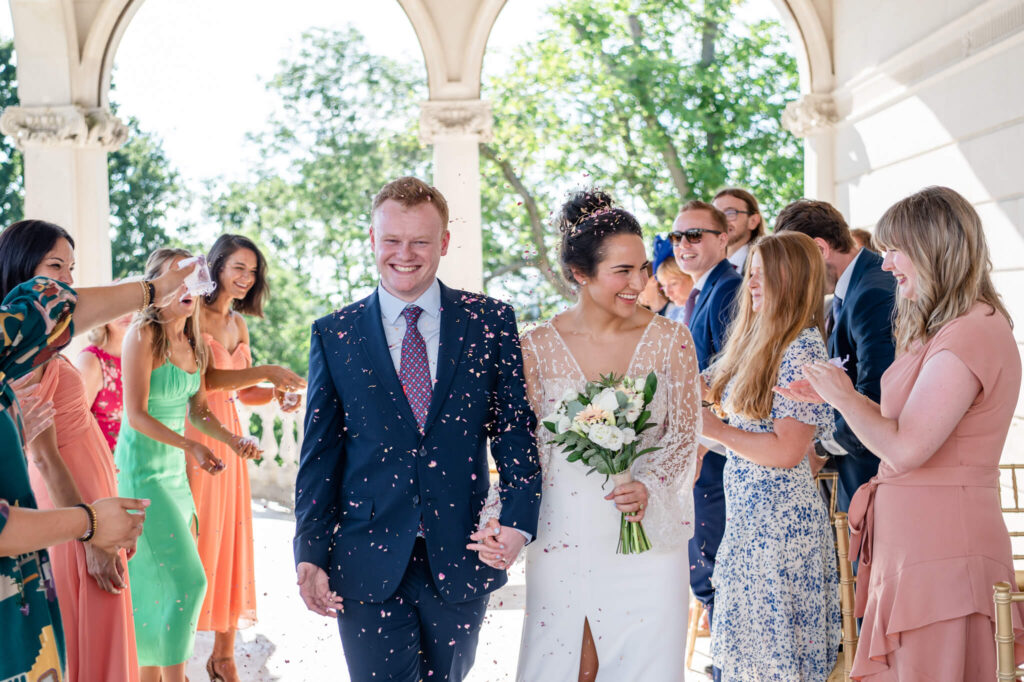 The couple during confetti moment captured by Shropshire wedding photographer