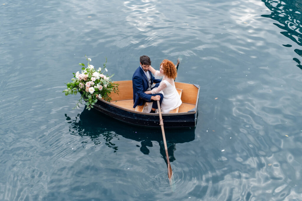 Couple portraits in the boat at Euridge Manor. Luxury Cotswolds wedding venue