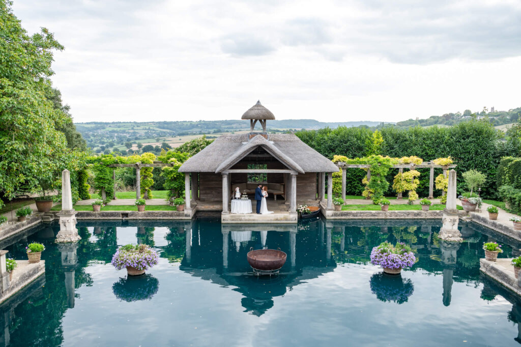 The boathouse wedding ceremony at Euridge Manor in the Cotswolds. Fairytale wedding venue