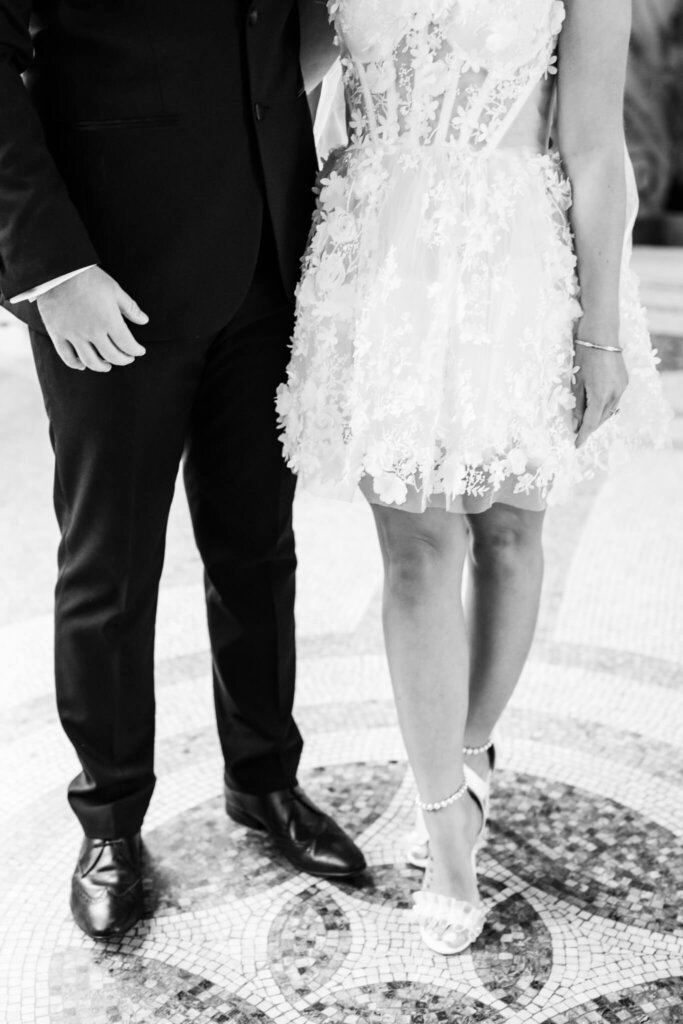 Black and white wedding details at Hawkstone Hall. Bridal mini dress inspiration with pearl wedding heels